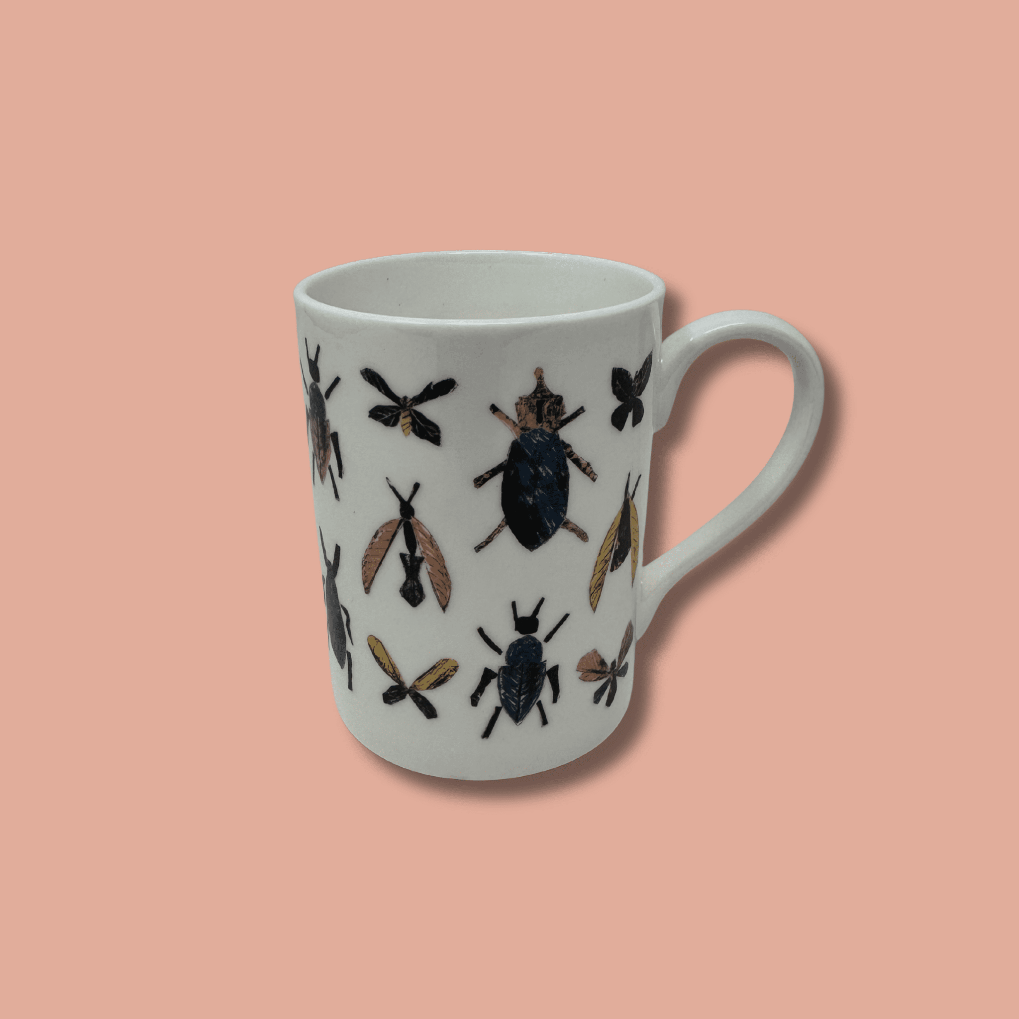 Insect print mug side view handle to right