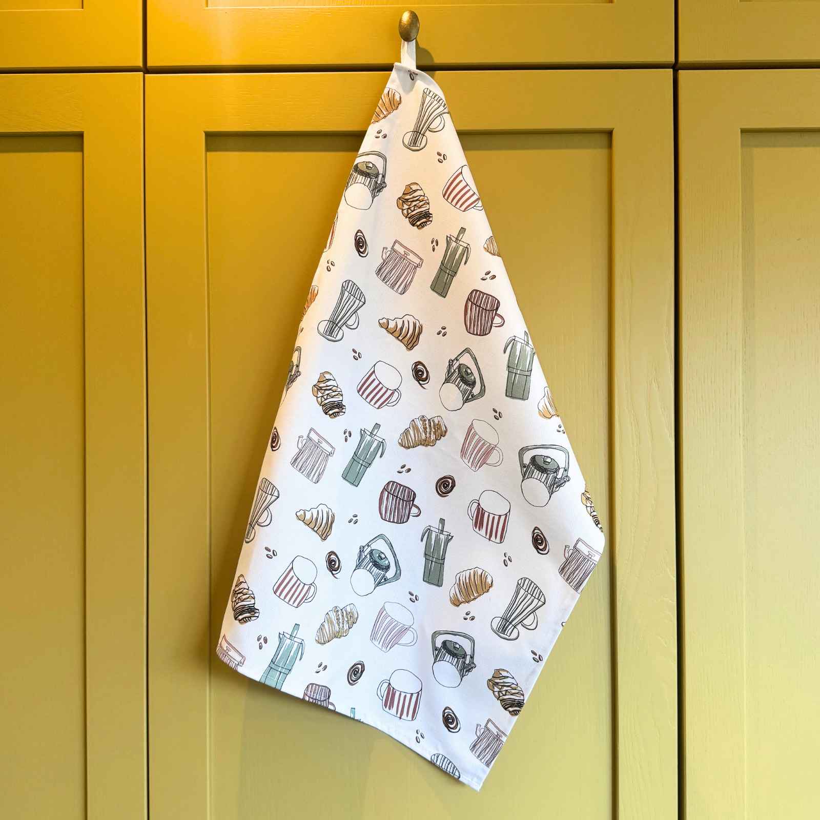 cafe tea towel yellow cupboard