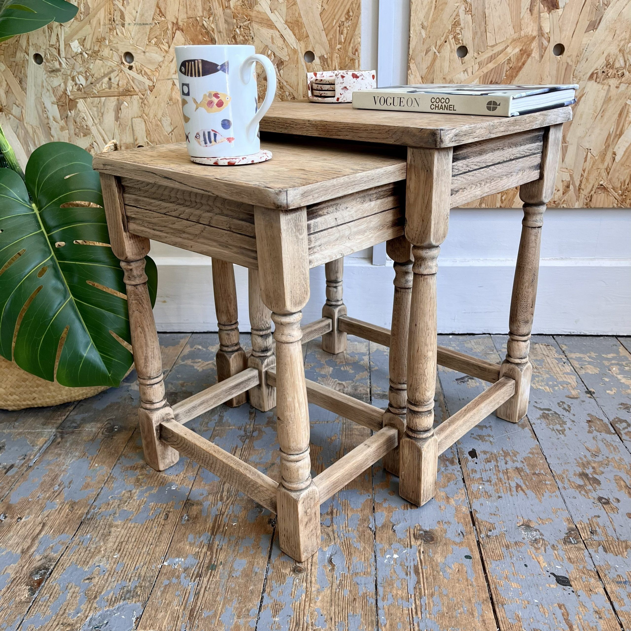 A pair of sanded side tables