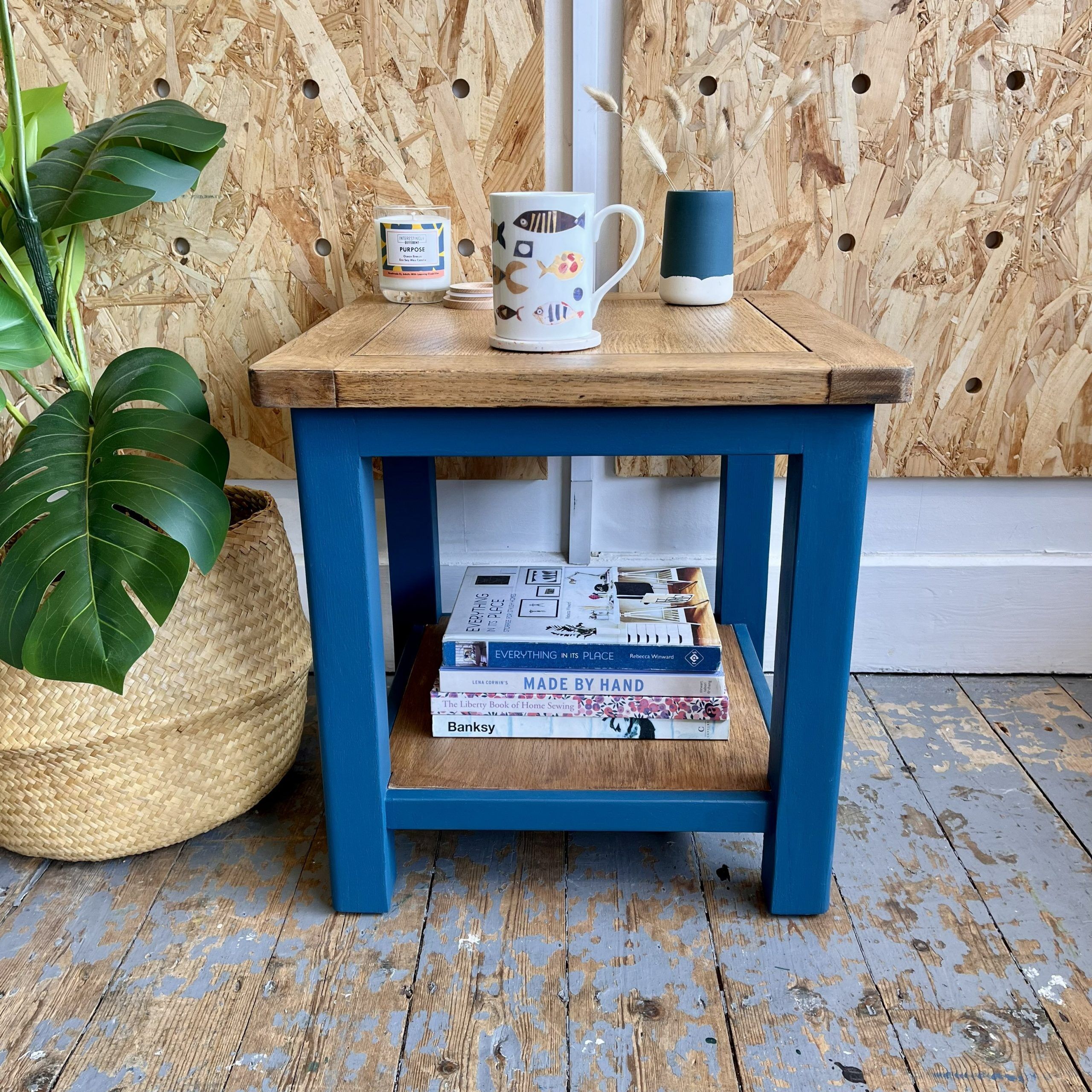 Blue sidetable with wooden top and shelf