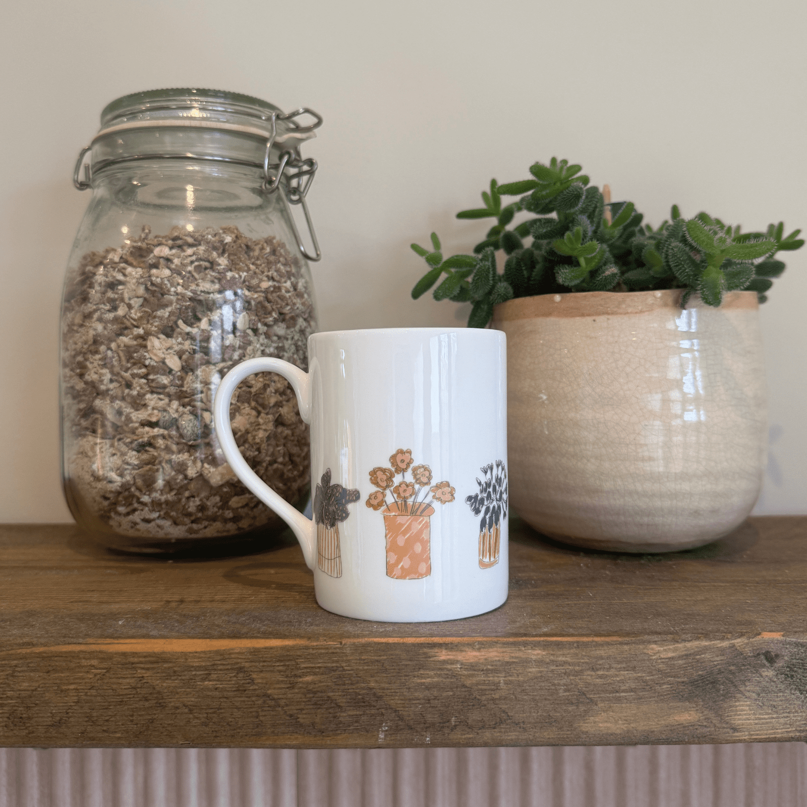 plant mug on shelf