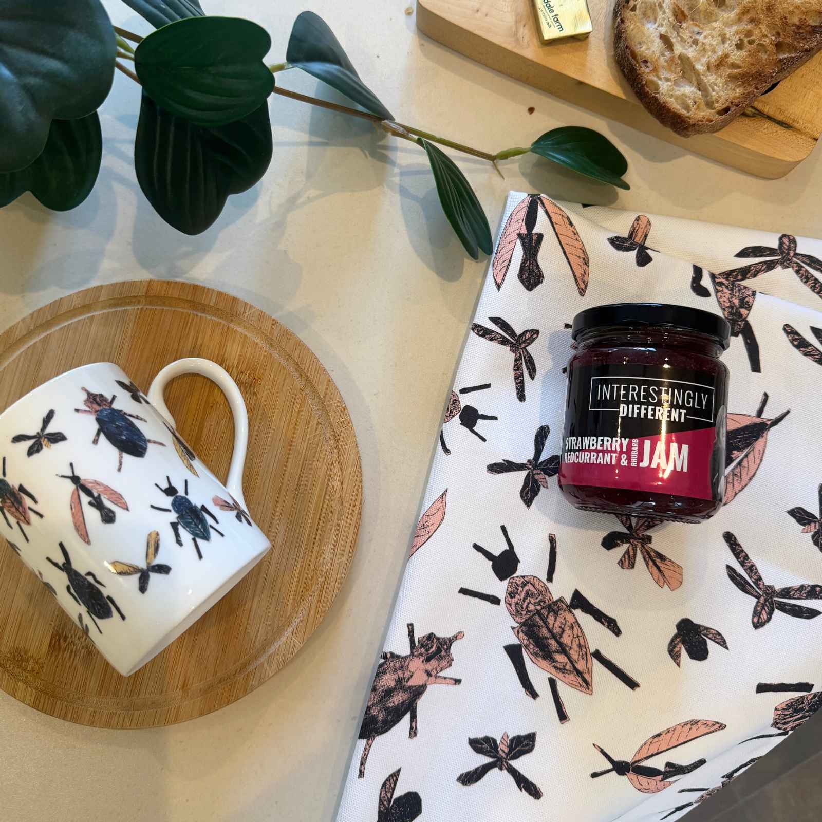 jam on teatowel with mug