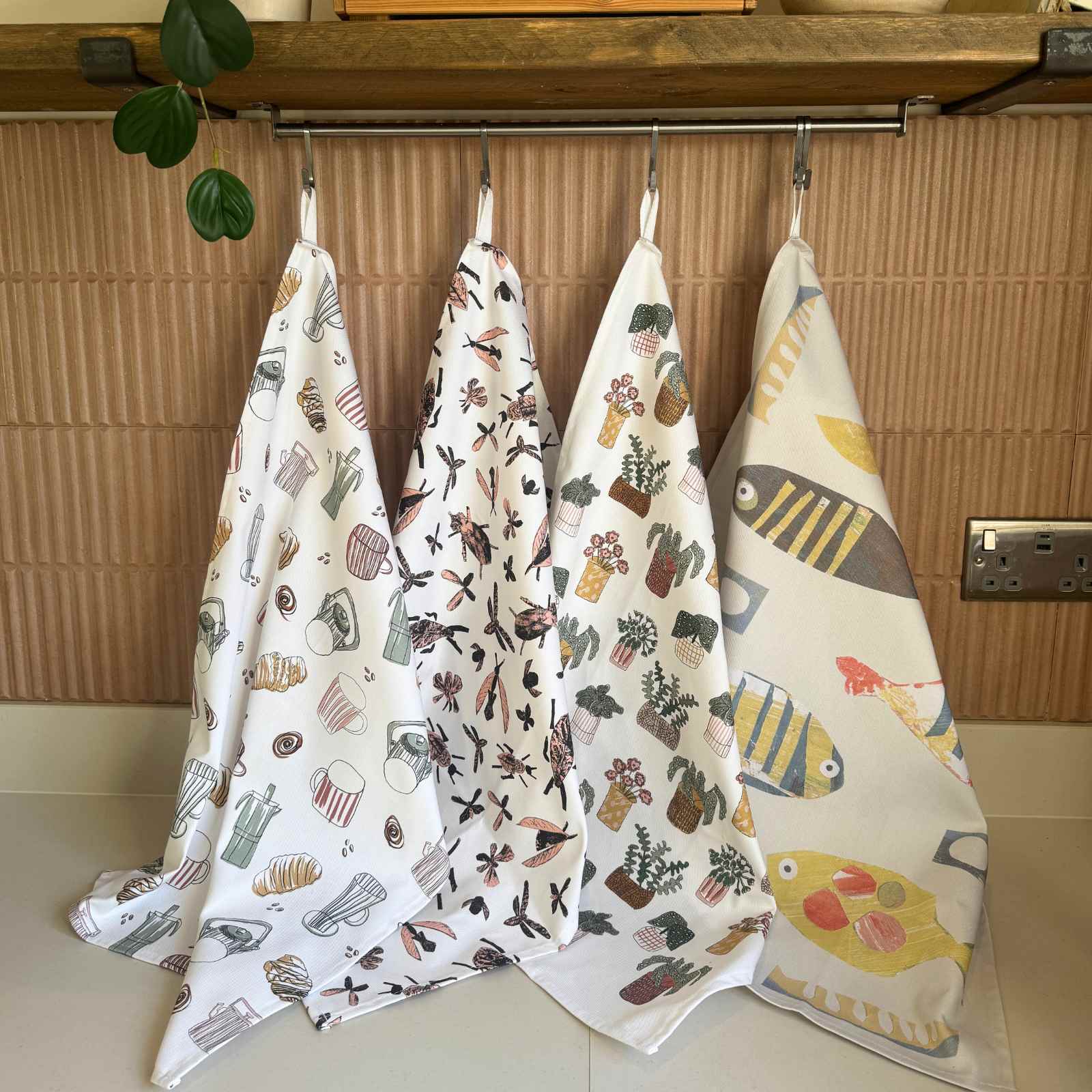 fish teatowel with others in the range