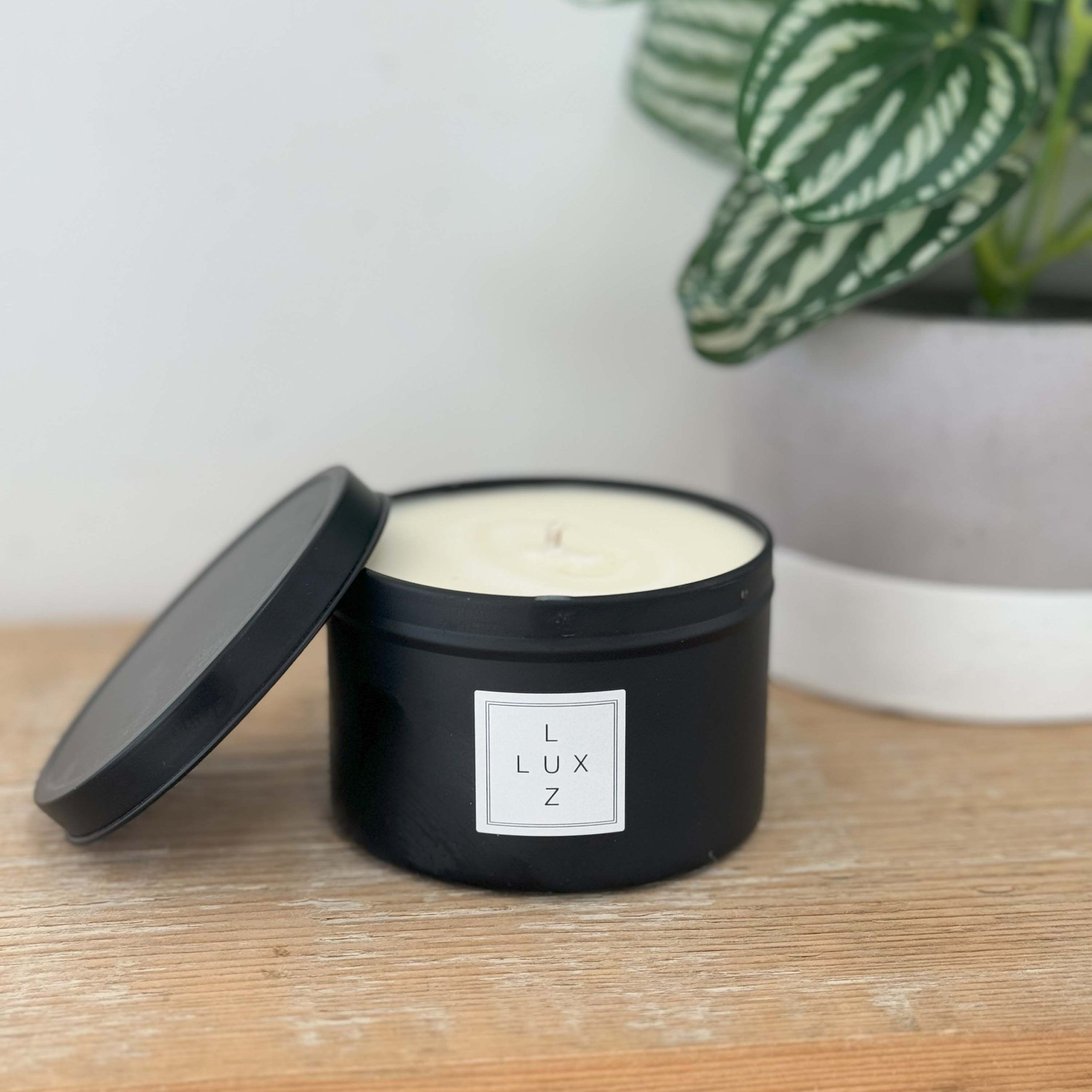 lux luz black tin candle