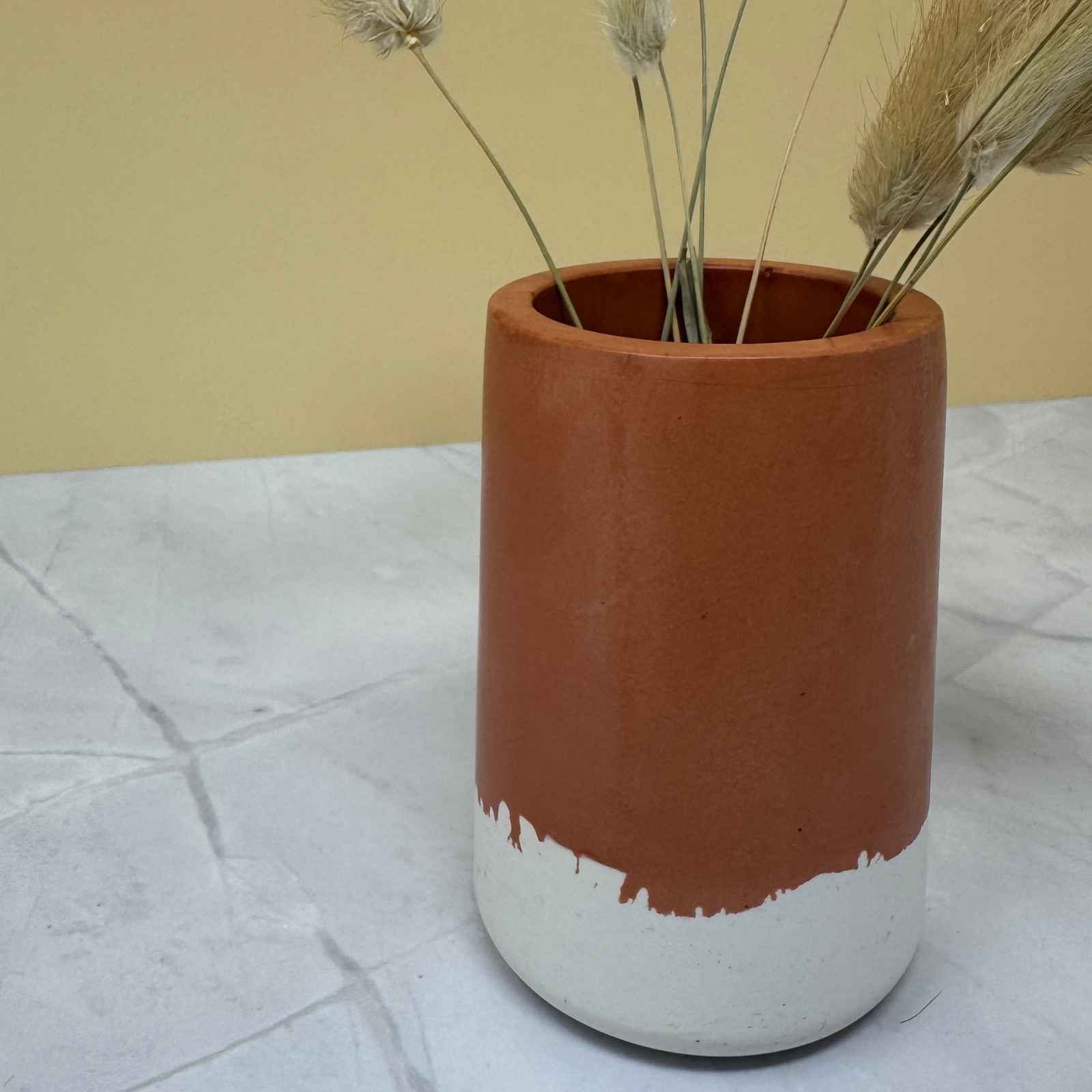 close up terracotta white jesmonite vase